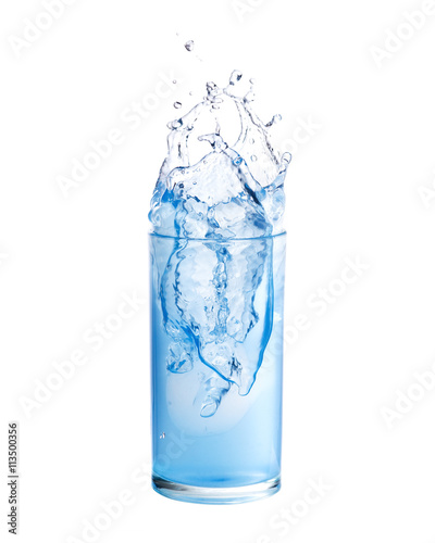 Water splashing out of a glass., Isolated white background.