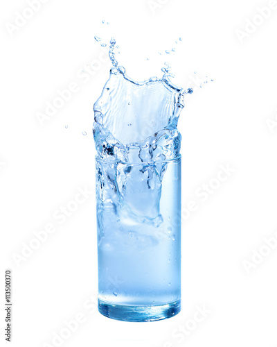 Water splashing out of a glass., Isolated white background.