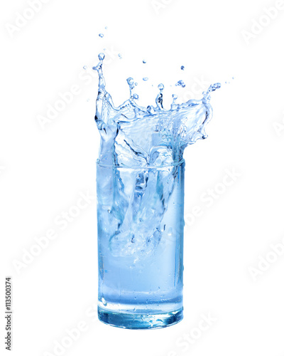 Water splashing out of a glass., Isolated white background.