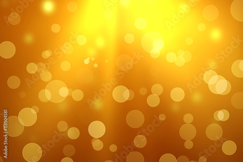 Blurred Golden Bokeh Background with sparkles and glitter.Golden