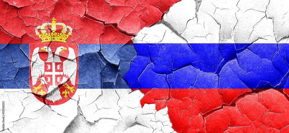 Serbia flag with Russia flag on a grunge cracked wall
