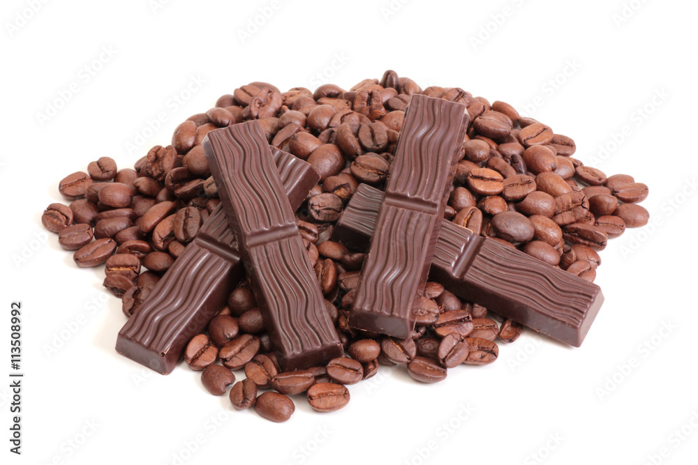 Coffee beans and chocolate on a white background Coffee beans and chocolate on a white background