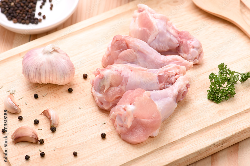 Chicken wings (wingstick) uncooked with garlic black pepper and Chicken wings (wingstick) uncooked with garlic black pepper and