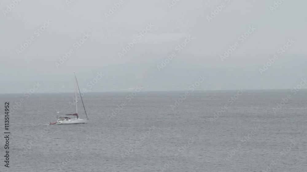 Boat traveling in the morning haze,Greece Boat traveling in the morning haze,Greece