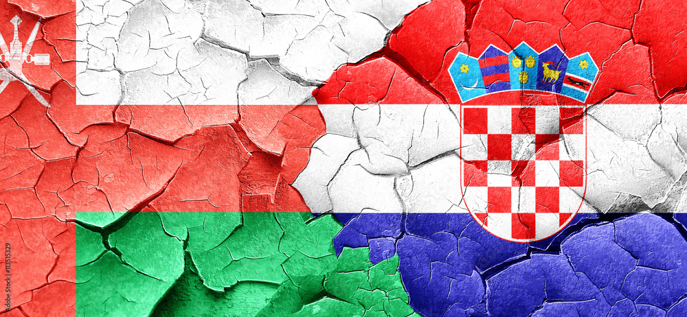 Oman flag with Croatia flag on a grunge cracked wall Oman flag with Croatia flag on a grunge cracked wall