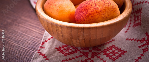 Bowl of raw apricots