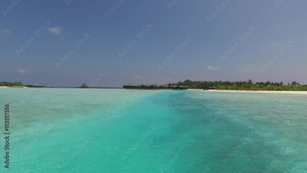 bungalow huts in sea on tropical resort beach bungalow huts in sea on tropical resort beach