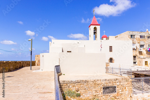 White Maronites house on the  fortress wall in the Old Acre  photo