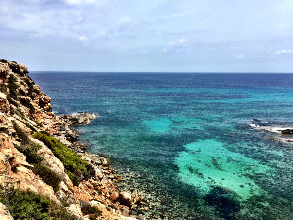 Rock beach Beach in Formentera Spain Rock beach Beach in Formentera Spain