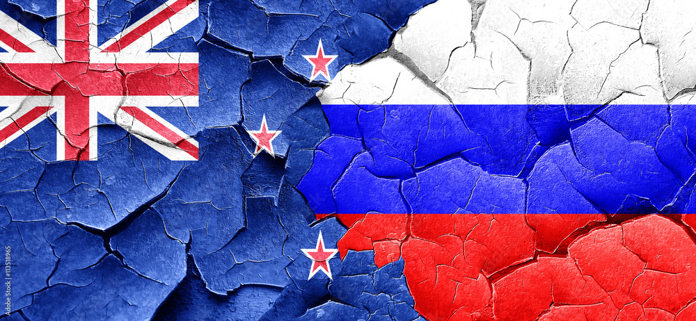 New zealand flag with Russia flag on a grunge cracked wall