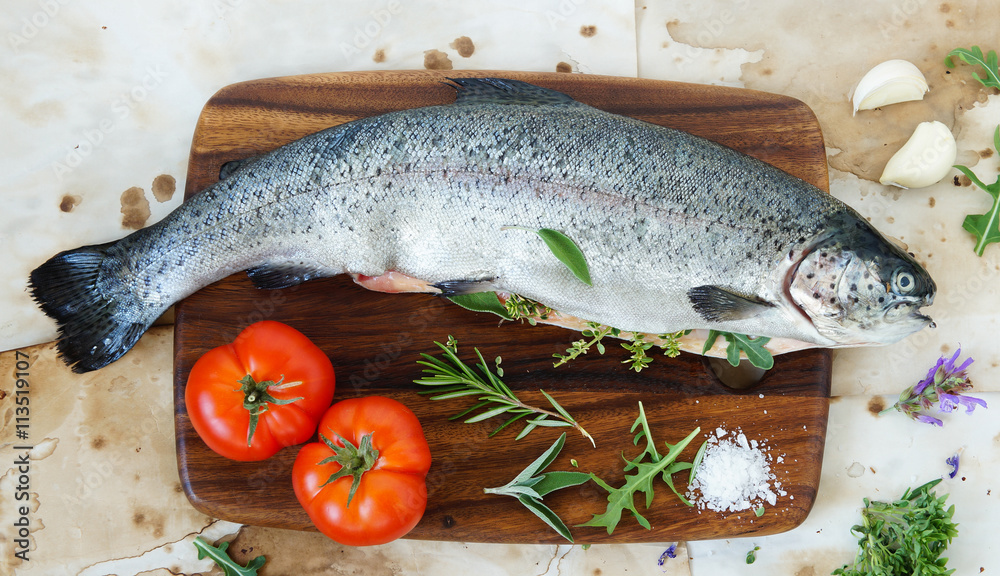 fresh rainbow trout on the cutting board ready to cook fresh rainbow trout on the cutting board ready to cook