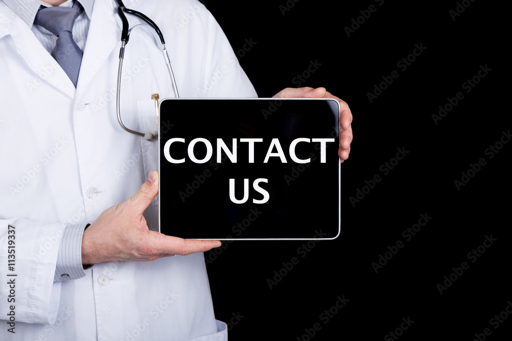 technology, internet and networking in medicine concept - Doctor holding a tablet pc with contact us sign. Internet technologies in medicine and tourism technology, internet and networking in medicine concept - Doctor holding a tablet pc with contact us sign. Internet technologies in medicine and tourism