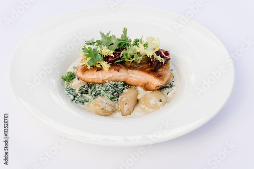 Salmon with steamed spinach and creamy potatoes