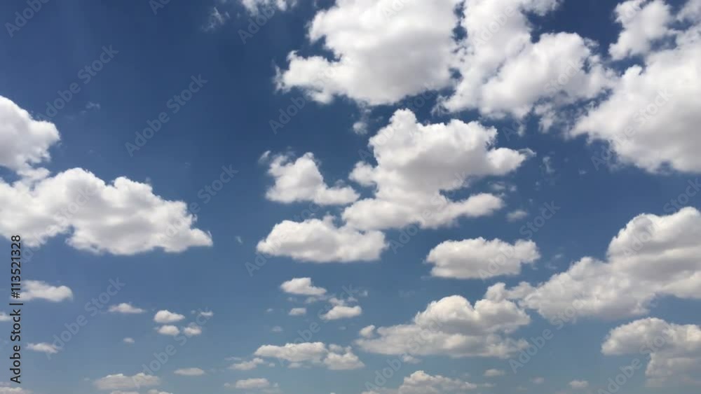 white clouds against blue sky
