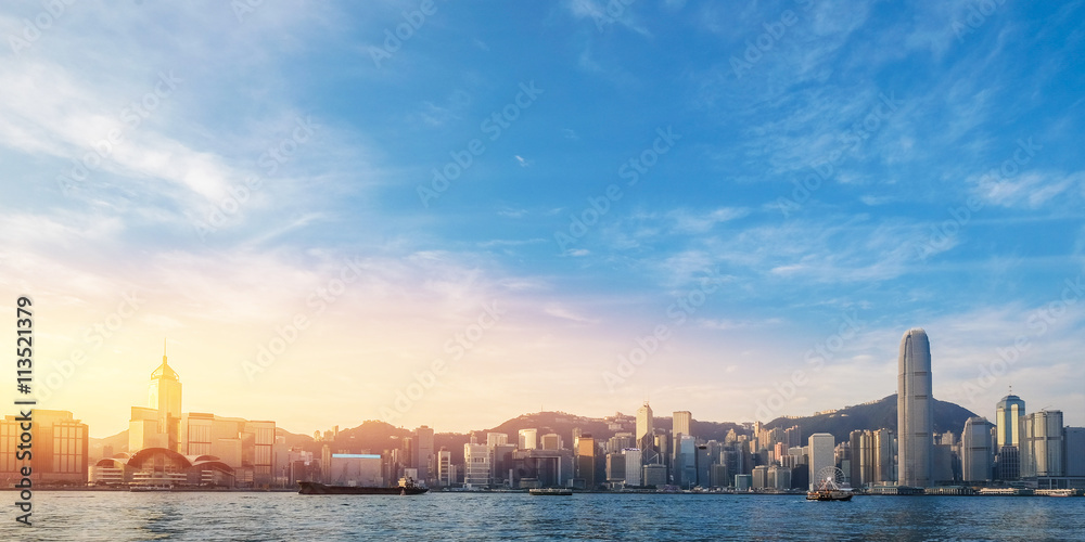 Φωτογραφία Hong Kong's Victoria Harbour in sunrise with text welcome to Hon