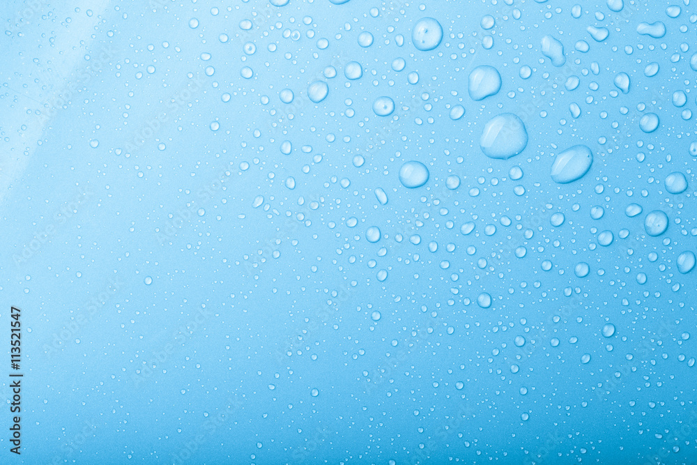 Drops of water on a color background. Blue. Selective focus. Ton Drops of water on a color background. Blue. Selective focus. Ton