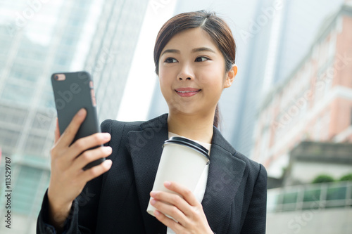 Businesswoman hold with coffee and cellphone Free Download Businesswoman hold with coffee and cellphone - GFXLoad