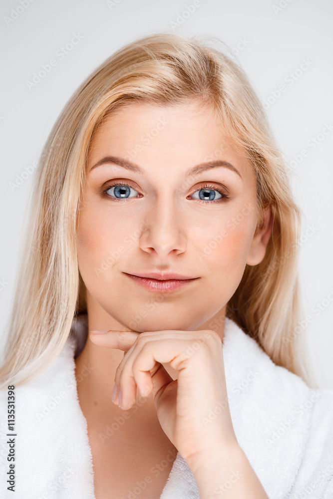 Fototapeta premium Portrait of young pretty girl over white background.