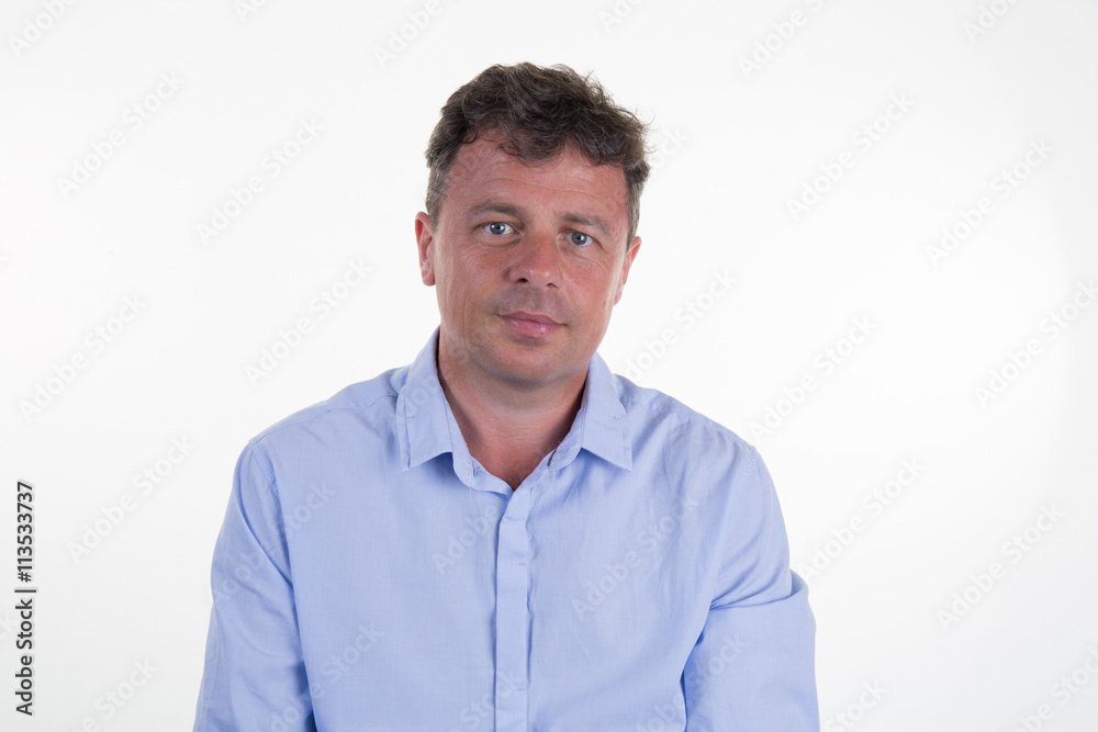 Portrait of a handsome man wearing blue shirt isolated Portrait of a handsome man wearing blue shirt isolated