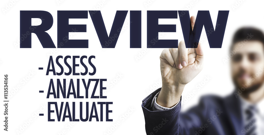 Business man pointing the text: Review Business man pointing the text: Review