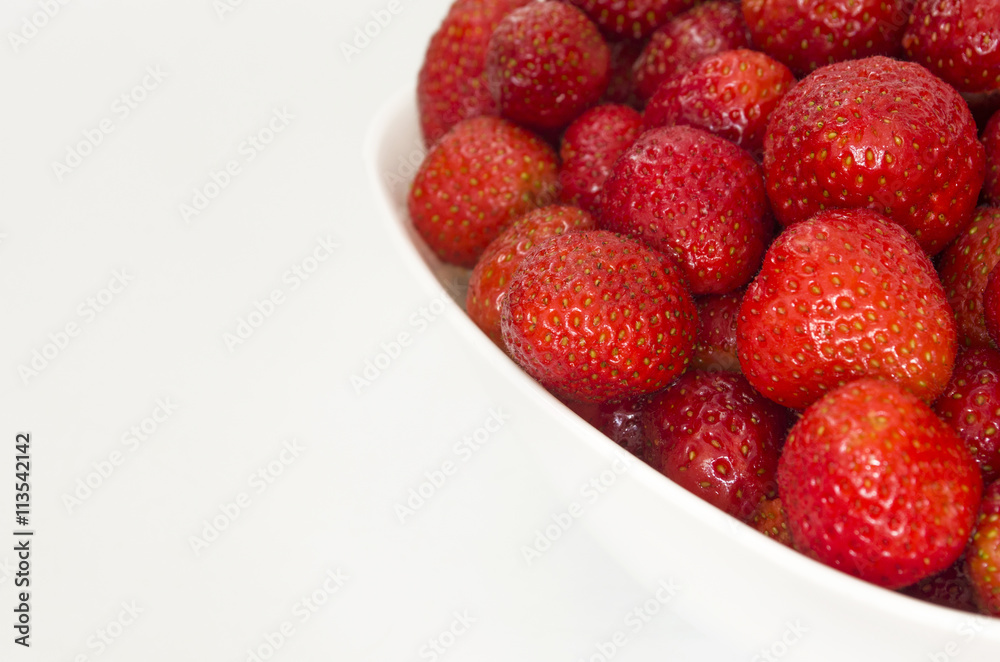 Ripe strawberry with copy space. Summer berries isolated on white background. Ripe strawberry with copy space. Summer berries isolated on white background.