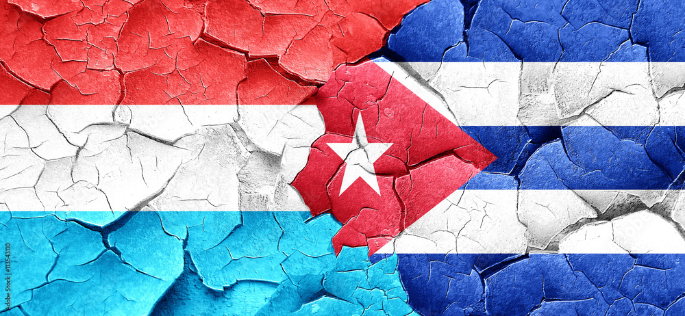 Luxembourg flag with cuba flag on a grunge cracked wall Luxembourg flag with cuba flag on a grunge cracked wall
