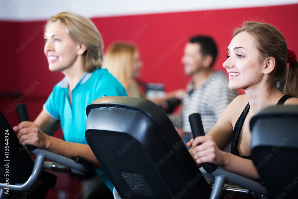 Fototapeta premium Active adults in gym