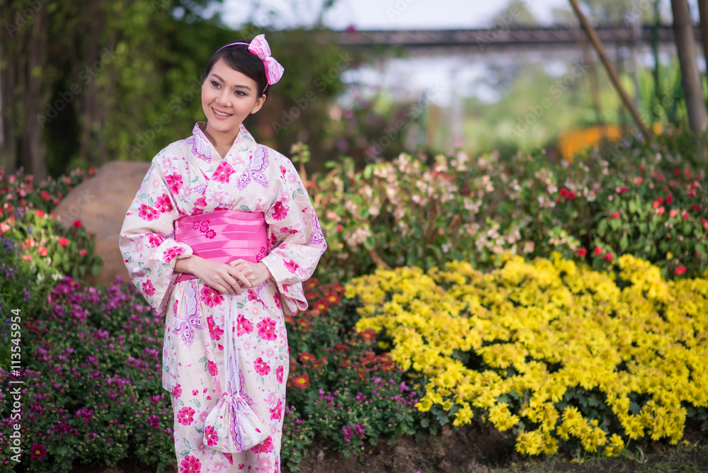 Beautiful young woman wearing japanese traditional Yukata Beautiful young woman wearing japanese traditional Yukata