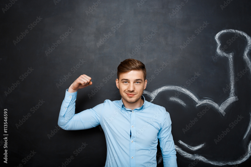 Picture of  funny man with  fake muscle arm