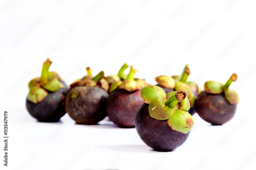 Mangosteens on white background. Mangosteens on white background.