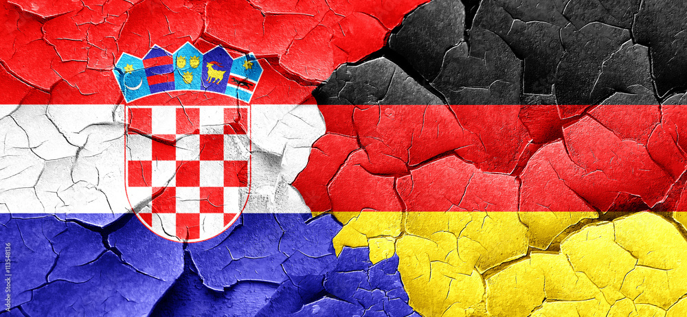 croatia flag with Germany flag on a grunge cracked wall
