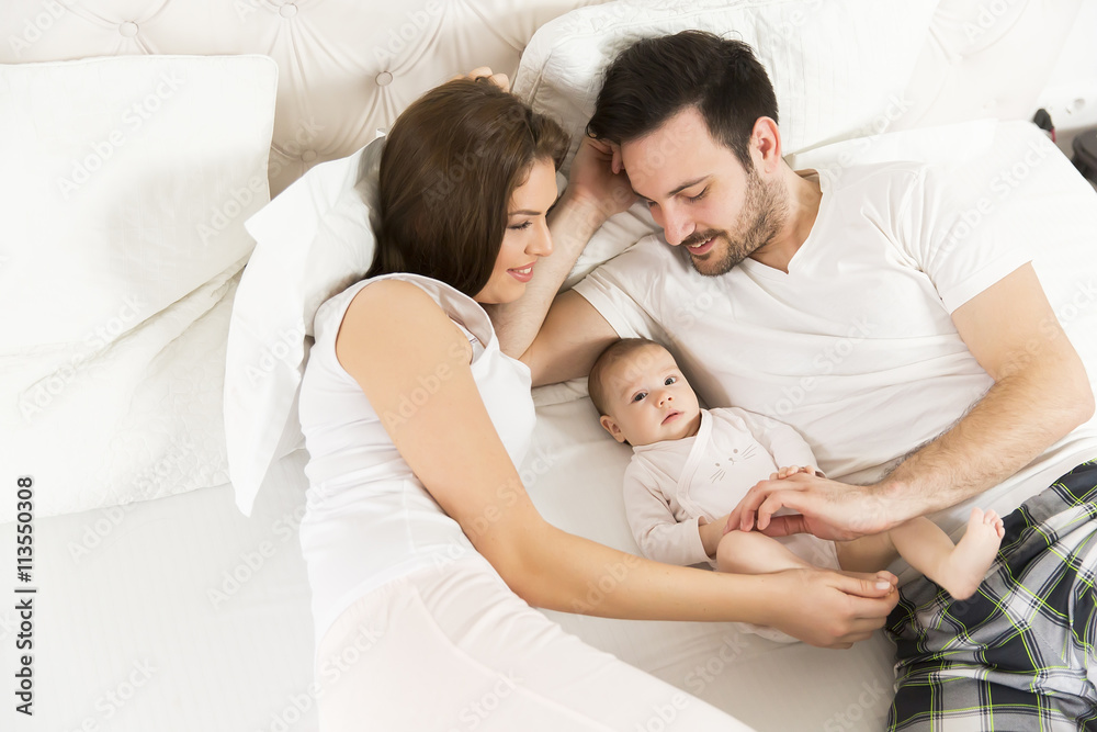 Happy family with newborn baby