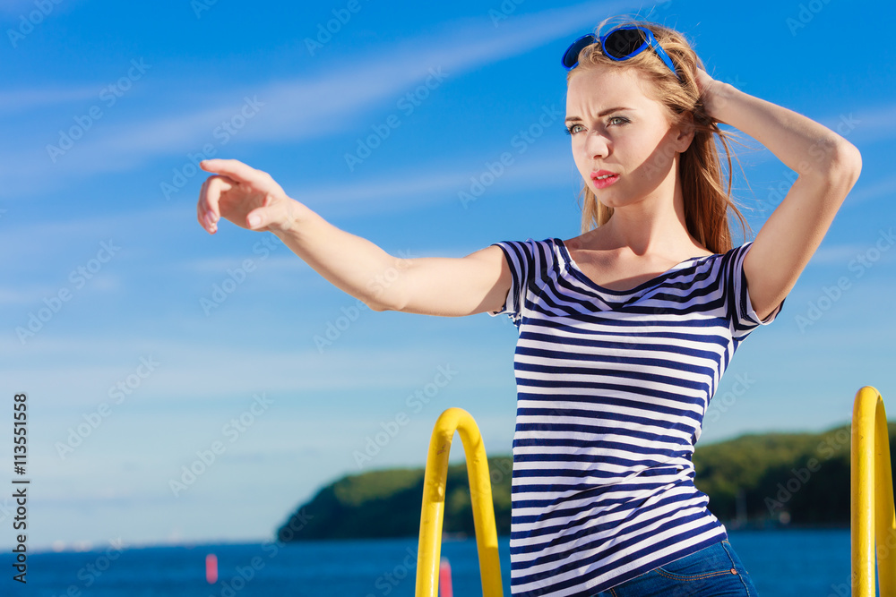 woman casual style pointing on sky background woman casual style pointing on sky background