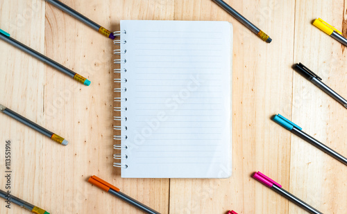 Wallpaper Mural Education stuff on wooden table.pen ,colour pen ,book, Top view Torontodigital.ca