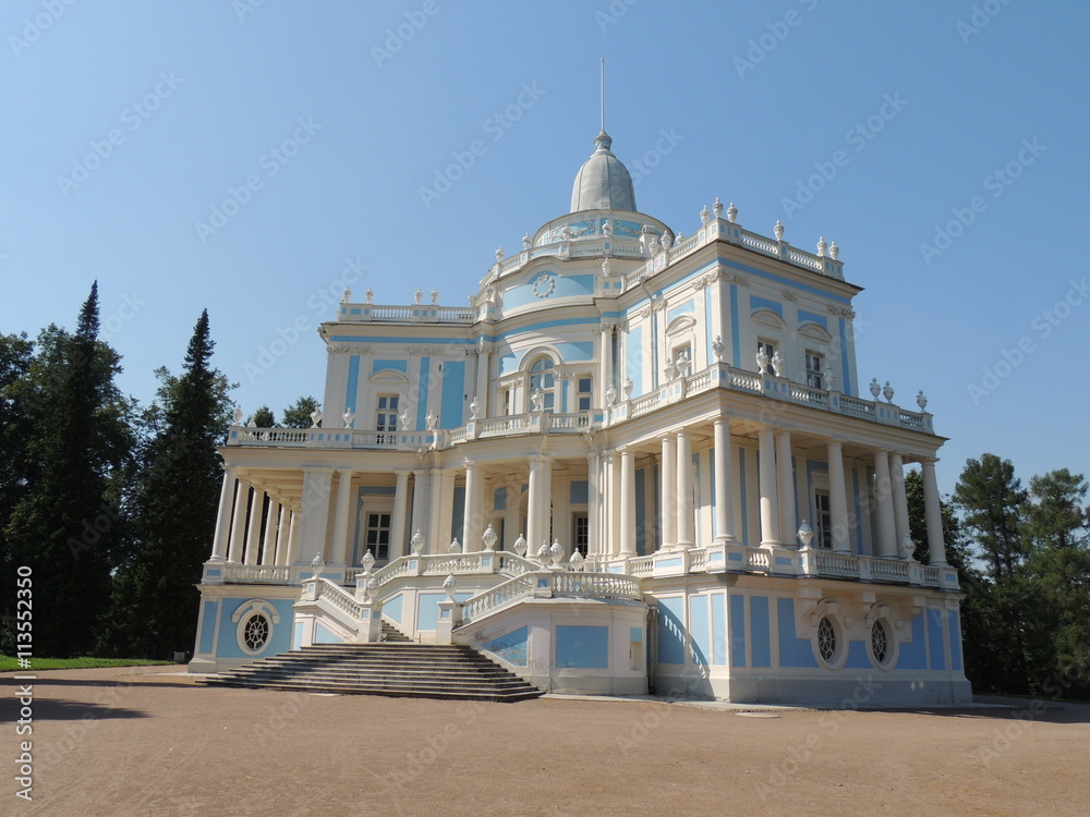 Obraz premium beautiful vintage blue ann white building with columns and staircase