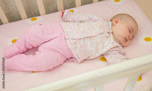 Very nice sweet baby sleeping in crib