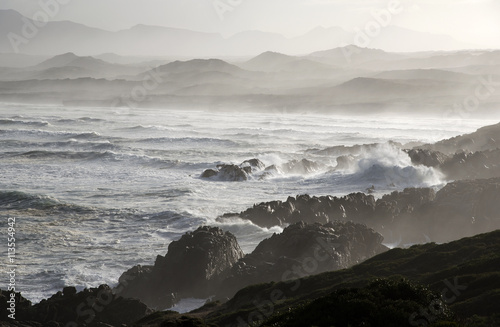 Atlantic Ocean crashing on the shore close to Hermanus in the Western Cape South Africa © petert2