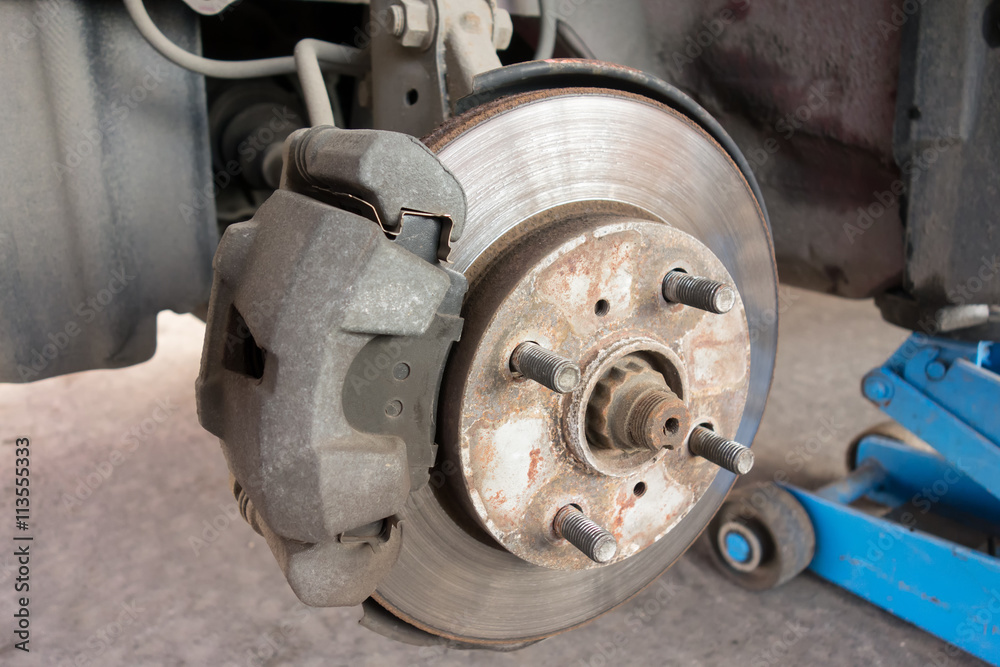 Modern car take wheel off show brake disk and caliper assembly