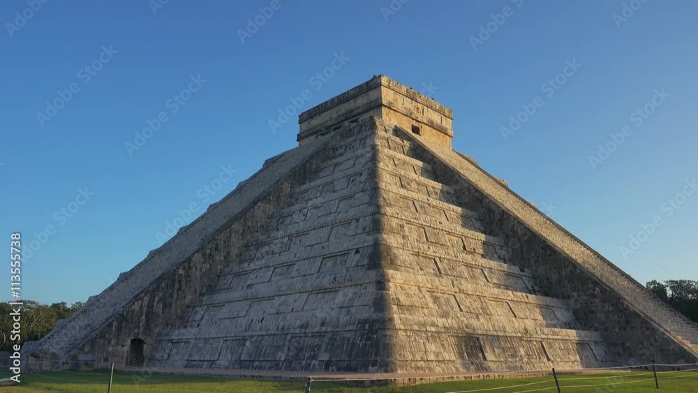 chichen itza kukulcan temple clear sky tilt down no people chichen itza kukulcan temple clear sky tilt down no people