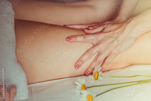 Woman having sports foot massage.