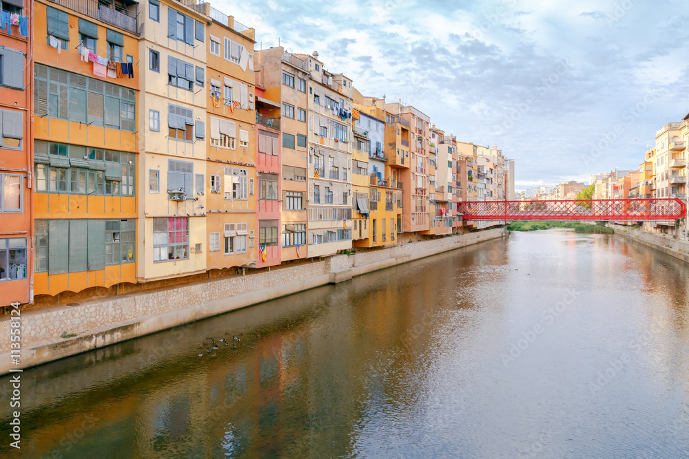 Girona. Multi-colored facades of houses on the river Onyar.