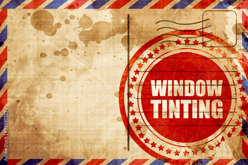 window tinting, red grunge stamp on an airmail background
