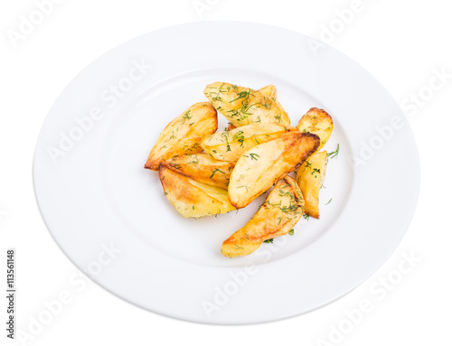 Baked potato wedges with minced dill.