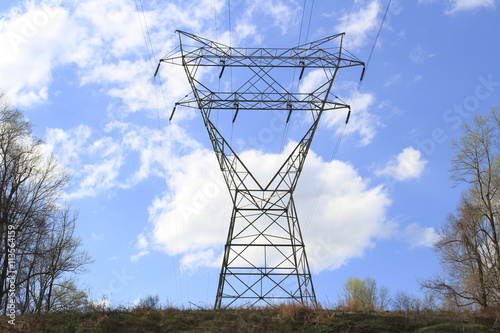 Wallpaper Mural Electricity tower against blue sky with clouds Torontodigital.ca