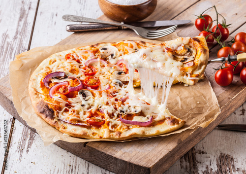 Homemade pizza with melted cheese