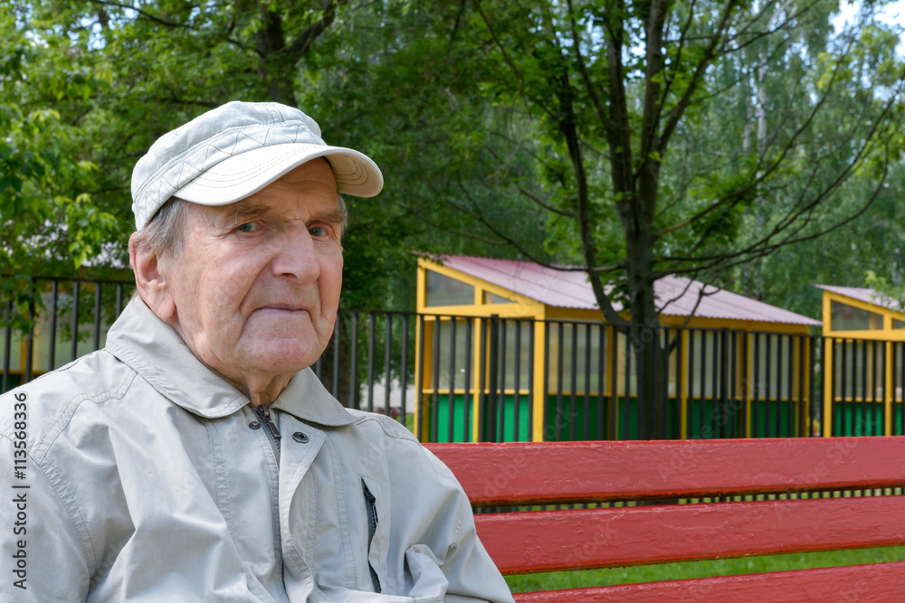 Old man on a park bench