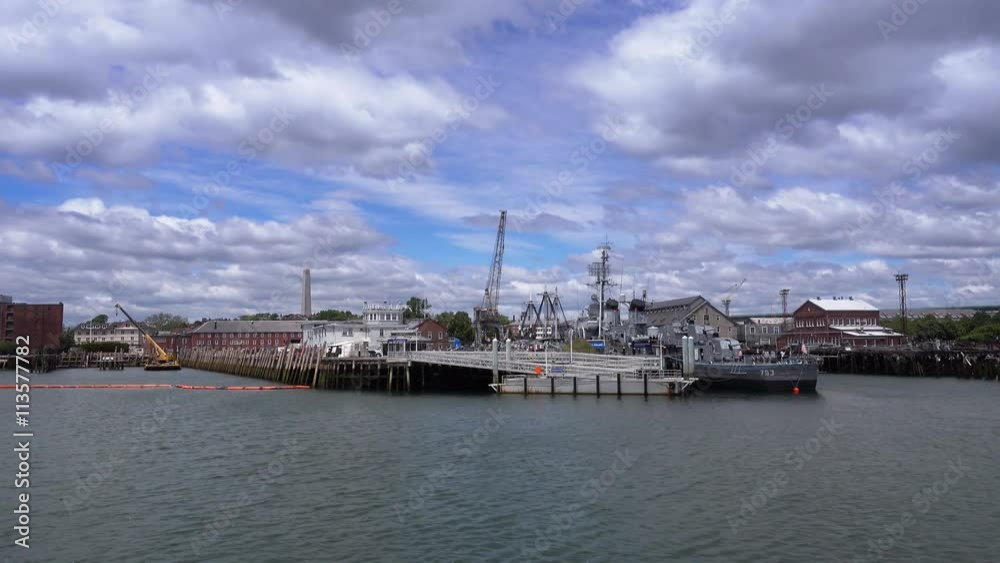 A daytime establishing shot of Boston National Historical Park on Boston Harbor. A daytime establishing shot of Boston National Historical Park on Boston Harbor.