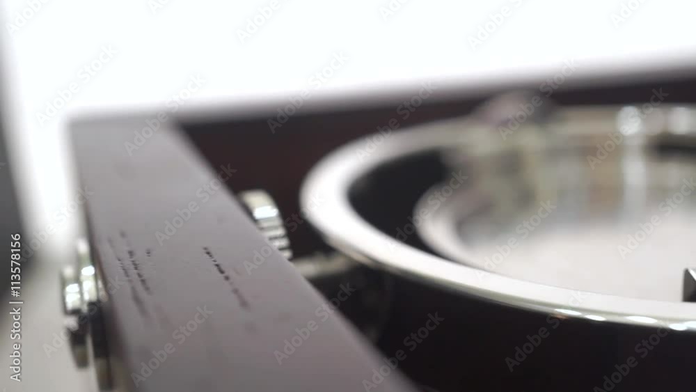 Dolly macro shot of old compass bearing with steel knobs Dolly macro shot of old compass bearing with steel knobs