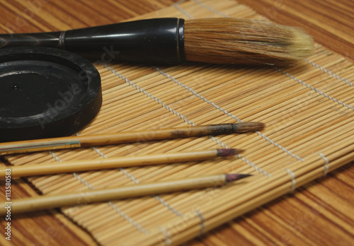 Chinese writing brush and ink stone photo