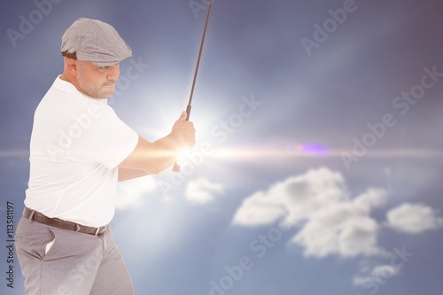 Golf player taking a shot 